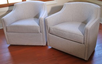 Pair Of Stone & Leigh Swiveling Armchairs Upholstered In A Light Blue Linen Tweed Fabric.