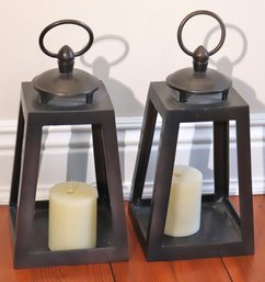 Pair Of Small Heavyweight Metal Lanterns In A Trapezoid Shape With Flameless Candles.