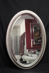 Oval Beveled Mirror In A Silver- Colored Frame 22 X 32 Inches