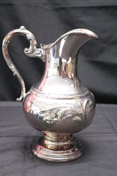 Manhattan Plate Co. Silver Plated Pitcher With Embossed Flowers.