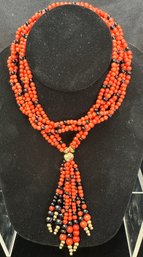 26 INCH RED CORAL AND ONYX MULTISTRAND BEADED NECKLACE WITH 14K YG BEAD ACCENTS