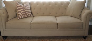 Stylish Sofa With Rolled Arms And Tufted Woven Linen Fabric In An Oatmeal Tone