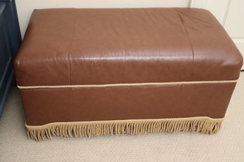 A Hope Chest Upholstered In Faux Leather Fabric, With Bun Feet And Fringes