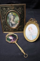 Two Antique Miniature Hand Painted And Framed Portraits And Brass Hand Mirror With Enamel Hand Painted Back