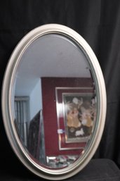 Oval Beveled Mirror In A Silver- Colored Frame 22 X 32 Inches