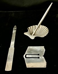 STERLING SILVER TIFFANY AND CO 3 PC DESKTOP ENSEMBLE - PEN IN SHELL DISH, BOOK MARK AND LETTER OPENER