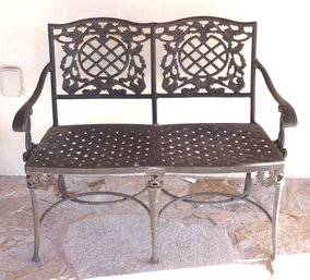 A Victorian Inspired Outdoor 2 Seat Metal Bench.