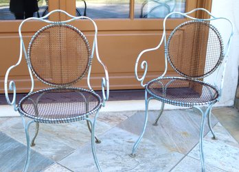 Pair Of Curvy Art Nouveau Look Outdoor Metal Chairs With Woven Metal Seat And Back.