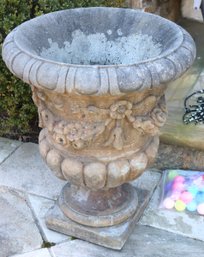 Large Solid Cement Urn Planter With Floral Garland And Egg And Dart Design.