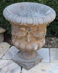 Large Solid Cement Urn Planter With Floral Egg And Dart And Garland Design.