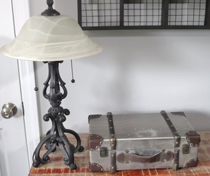 Wrought Iron Table Lamp With A Frosted Swirled Glass Shade And  Decorative Trunk Decor