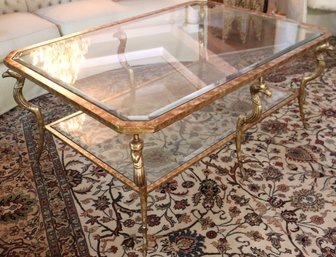 Oversized Modern Iron Coffee Table In A Mottled Gilt Foil Finish With A Beveled Edge Glass Top And Figural Cra