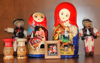 Lot Of Eastern European Decorative Items With Nesting Dolls, Cloth Dolls & S & P
