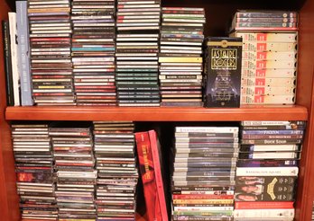 Huge Lot Of DVDs Together With CDs, Featuring Movies And Music. See Photos For Titles.