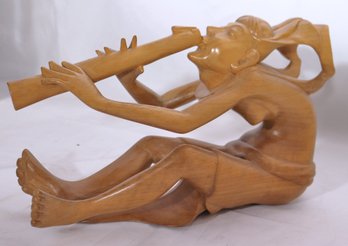 Vintage Asian Carved Wooden Sculpture Of A Man With Flute