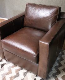 Crate And Barrel Leather Swivel Armchair With Seat And Back Cushions.