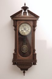 Small Antique Inlaid Wood Clock, With Brass Face, Pendulum, And Key.