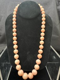 22.5 Inch Graduated Polished Pink Coral Necklace