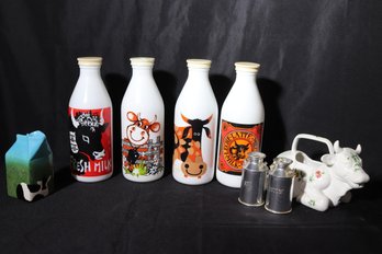 Eight Pieces Of Milk Related Collectables Including 4 Milk Glass Jars.