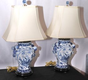 Pair Of Blue And White Canton Style Porcelain Lamps With Cream-colored Shades.