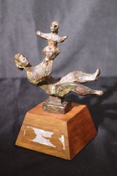 Chaim Gross Caring Sculpture In Bronze Mounted On Wooden Base.