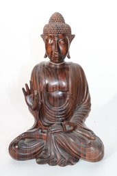 Peaceful Carved Rosewood Buddha With Symbolic Hand Gesture Signifying Discussion Of Buddhas Teachings