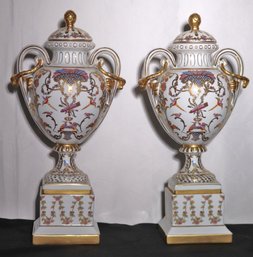 A Pair Of Chelsea House Rococo Style Porcelain Painted Urns With Lids.
