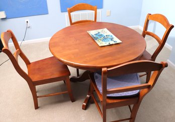 Round Wood (appears To Be Maple) Table With 4 Chairs.