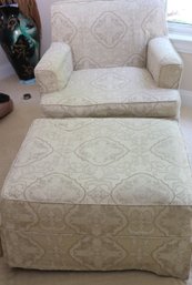 Comfortable Slipcovered Chair And Ottoman