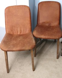 Two Modern Cushy Side Chairs With Wooden Legs.