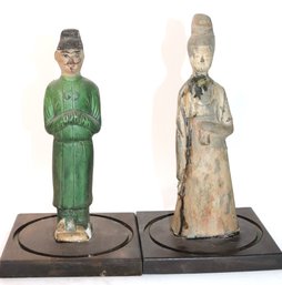 Two Asian Terra Cotta Figurines On Wooden Bases