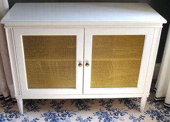 Contemporary White Cabinet With Gold Mesh Front Door Panels