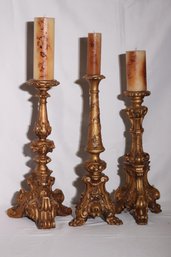 Three Baroque Style Highly Carved Candle Holders With Candles