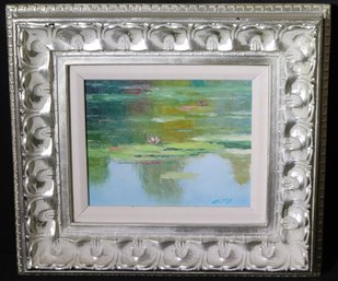 Signed Hand Painted Oil On Canvas Of A Lake Scene With Lilly Pads In A Silver Metallic Painted Wood Frame