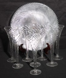 8 Ribbon Glass Champagne Flutes And A Round Glass Platter.