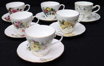 A Selection Of 6 Bone China Cups And Saucers With Flowers, Made In  England.