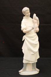 Lladro Bisque Porcelain 14.5 Tall Obstetrician Figurine Holding Newborn Baby.