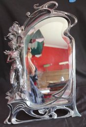 Vintage Chrome Metal Art Nouveau Vanity Mirror With Figural Detailing A Beveled Edge & Stand
