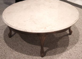 1960s Era Round Beige Marble Top Coffee Table On Wooden Frame With A  Curved Design.