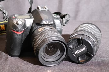 A Vintage Nikon Camera - DX AF- S Nikkei 18-70 With Promaster Lens 62  Mm.