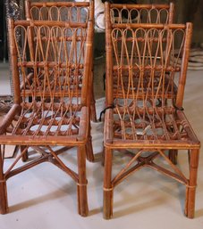 Set Of 4 Vintage Woven Bent Rattan Dining Chairs Measures Approximately 17 W X 20 D X 33.5 Tall.