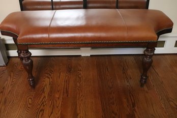 Frontgate Bench With Carved Wooden Legs And Leatherette Seat Upholstery.