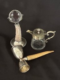 Assorted Items As Pictured With Bone Handled Sterling Silver Double Jigger, Creamer And Lens With Weighted
