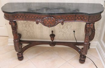 Highly Carved Wood Renaissance Style Console With A Marble Veneer Top In Good Clean Condition