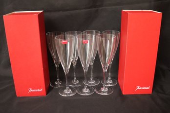 Seven Baccarat French Crystal Don Perignon 8.25 Inches Tall Glasses With Original Boxes.