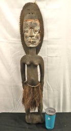 Carved And Papuan New Guinea Tribal Ancestor Figure Woman With Leather And Grass Skirt.