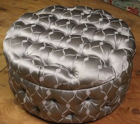 Round Tufted Ottoman In A Shiny Custom Silver Fabric