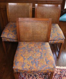 Set Of 3 Midcentury Chairs With Cane Backs And Original Paisley Cushions.