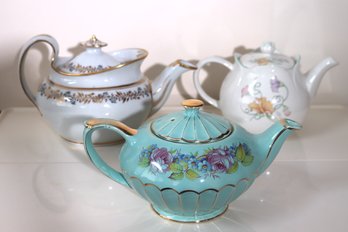 Lot Of 3 Vintage English Teapots Featuring An Early 19th Century White Porcelain Teapot With Under Tray.