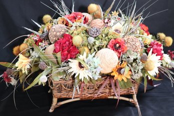 Decorative Faux Floral Centerpiece Arrangement In A Wicker Woven Basket